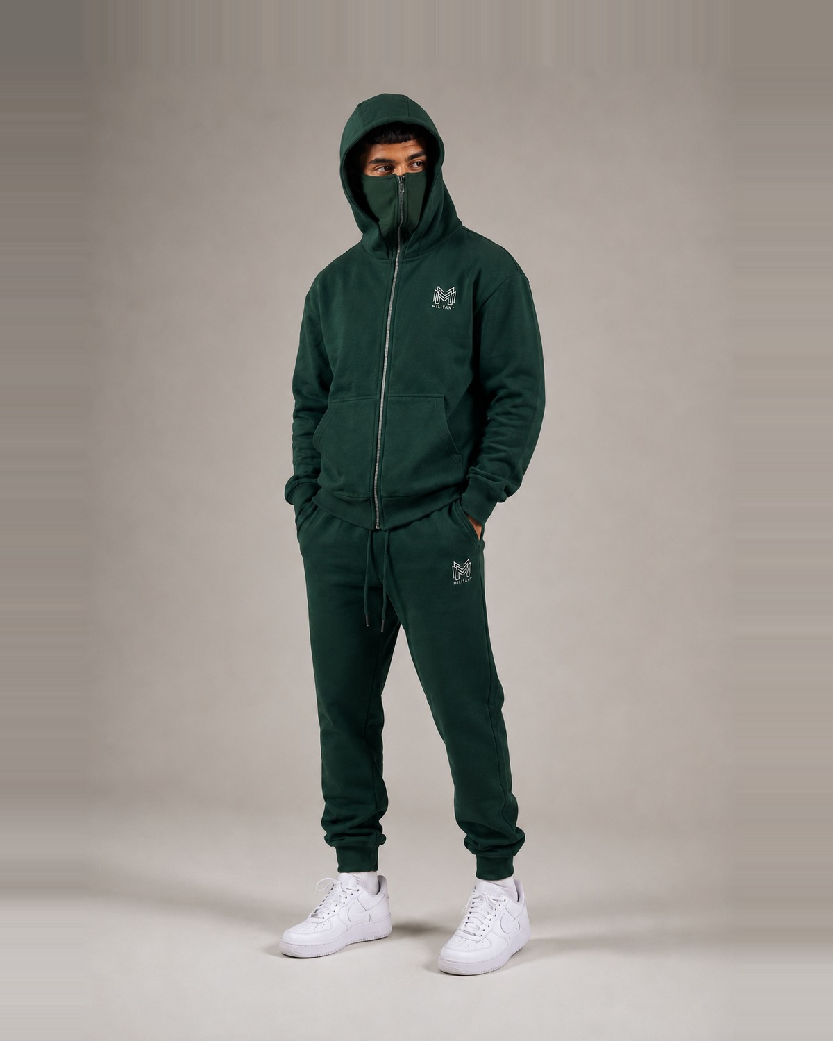 MILITANT hoodie worn with the integrated face cover deployed